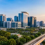 Best areas to buy apartments near IT hubs in Bangalore with modern residential buildings, offices, greenery, and metro connectivity